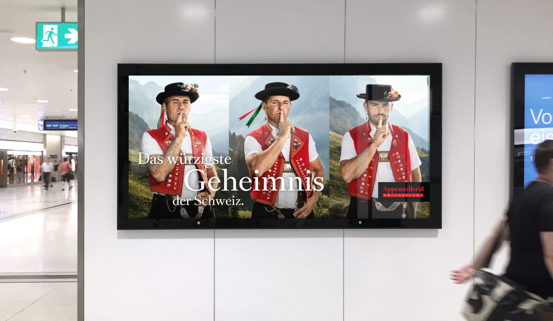 Écran publicitaire Appenzeller dans une galerie commerciale.