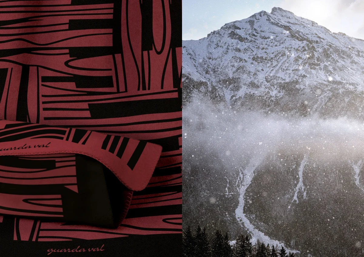 Motif rouge et noir Guarda Val associé à une photographie de montagne enneigée.