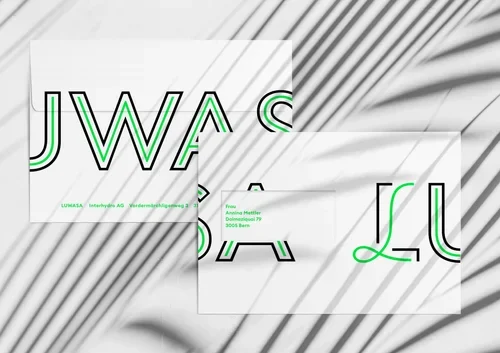 Papeterie Luwasa avec grandes lettres en contour vert et noir.