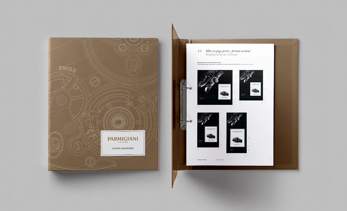 Classeur et documents Parmigiani Fleurier avec couverture dorée et dessins de mécanismes horlogers.